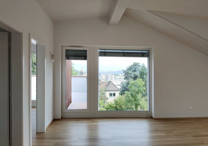Rénovation d'un petit immeuble des années 50 à Fribourg avec agrandissement bois