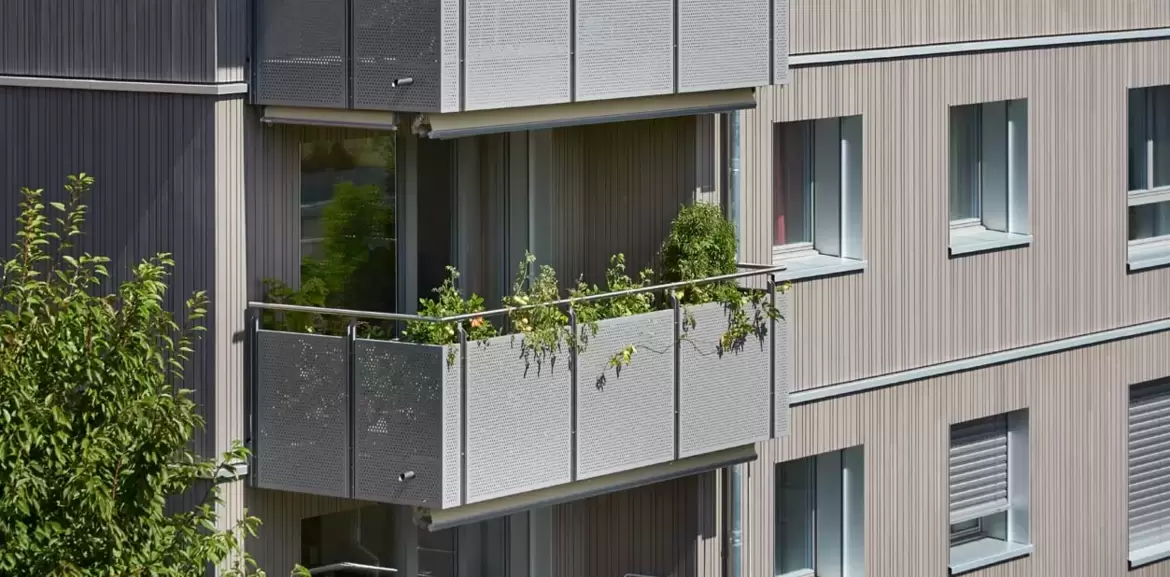 Nouvelles façades bois d'un immeuble rénové à Fribourg