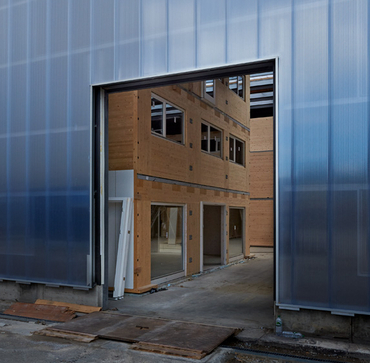 Avancement des travaux à BlueFactory, halle industrielle transformée en bureaux zéro carbone