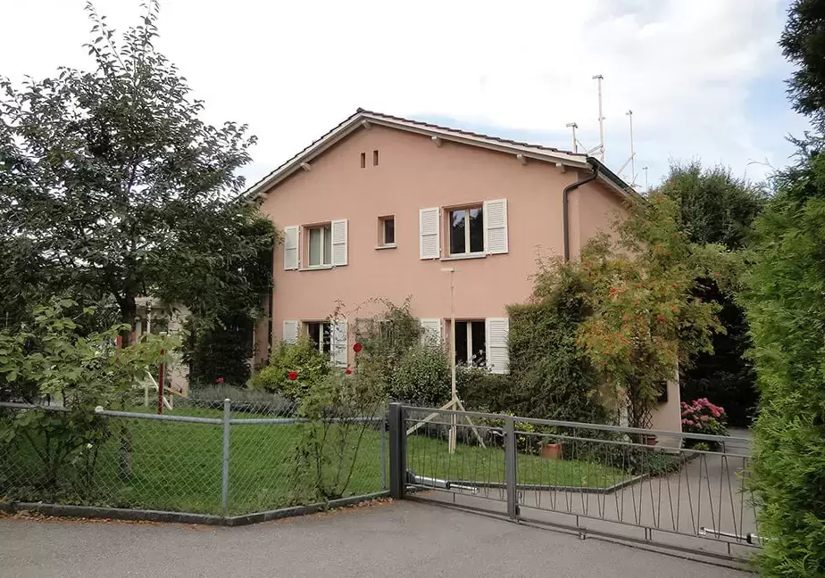 Surélévation en bois et rénovation Minergie d'une maison individuelle à Fribourg