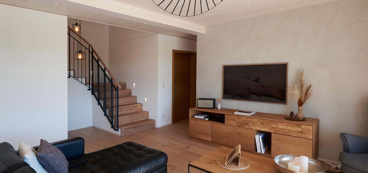Maison passive en bois à Surpierre(FR): séjour lumineux pour un confort optimal et un impact limité sur le climat