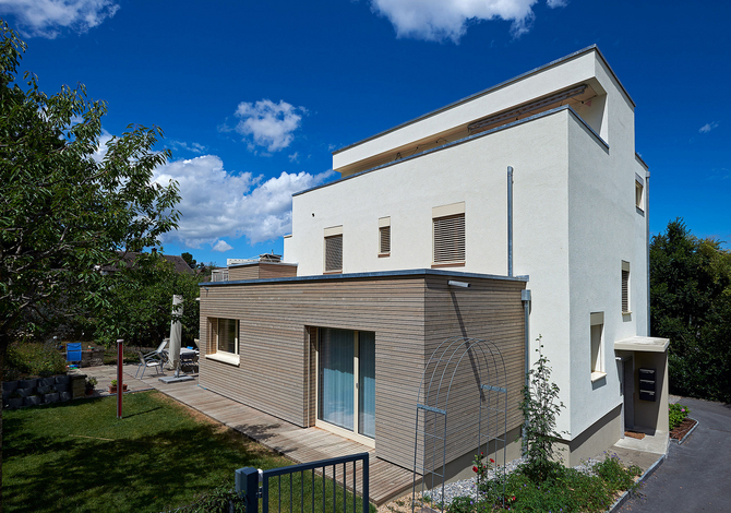 Rénovation et surélévation d'une maison des années 60 en structure bois Fribourg