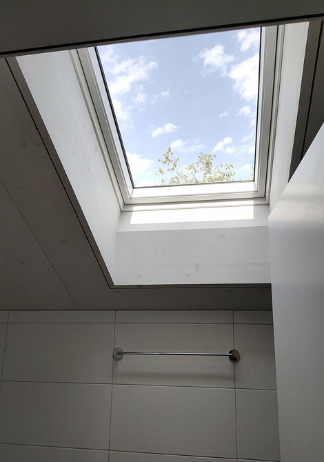 Rénovation d'un petit immeuble des années 50 à Fribourg avec agrandissement bois