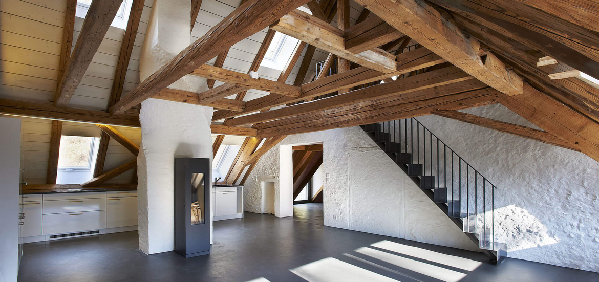 Première rénovation Minergie-Eco romande d'un bâtiment historique à Neuchâtel: création d'un loft sous les combles