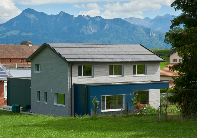 Construction d'une maison familiale passive en bois suisse
