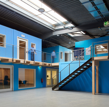 La halle bleue de Blue Factory: un projet qui respecte le principe de la société à 2000 watts pour 2050