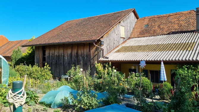Transformation d'un hangar à tabac et agrandissement d'une maison villageoise à Missy