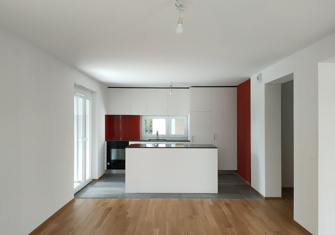 Rénovation d'un petit immeuble des années 50 à Fribourg avec agrandissement bois
