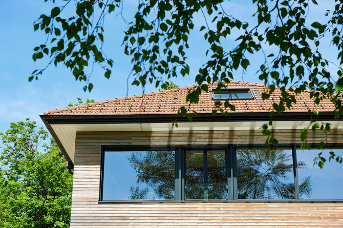 Rénovation énergétique Minergie d'une maison des années 50 en Gruyère à Fribourg