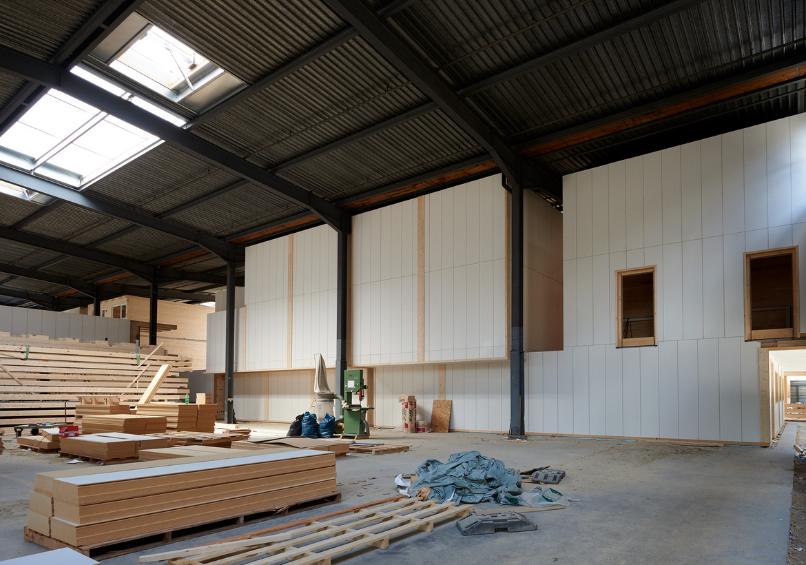 La halle bleue de BlueFactory: construction bois et isolation en matériaux biosourcés 