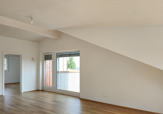 Rénovation d'un petit immeuble des années 50 à Fribourg avec agrandissement bois