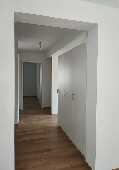 Rénovation d'un petit immeuble des années 50 à Fribourg avec agrandissement bois
