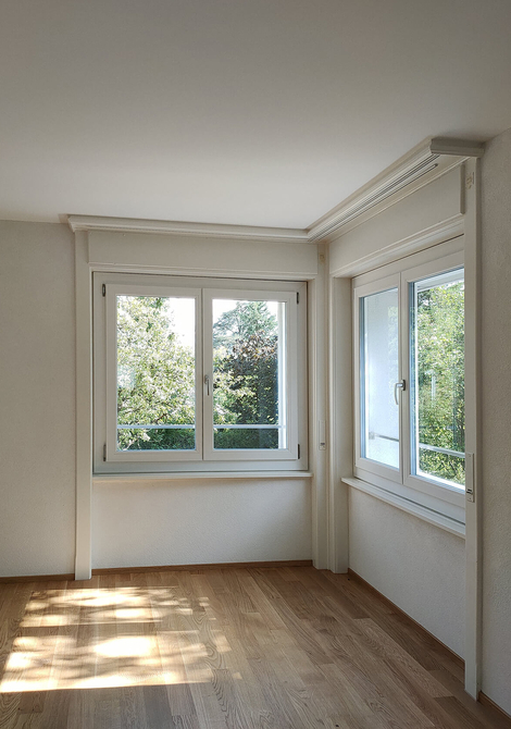 Rénovation d'un petit immeuble des années 50 à Fribourg avec agrandissement bois
