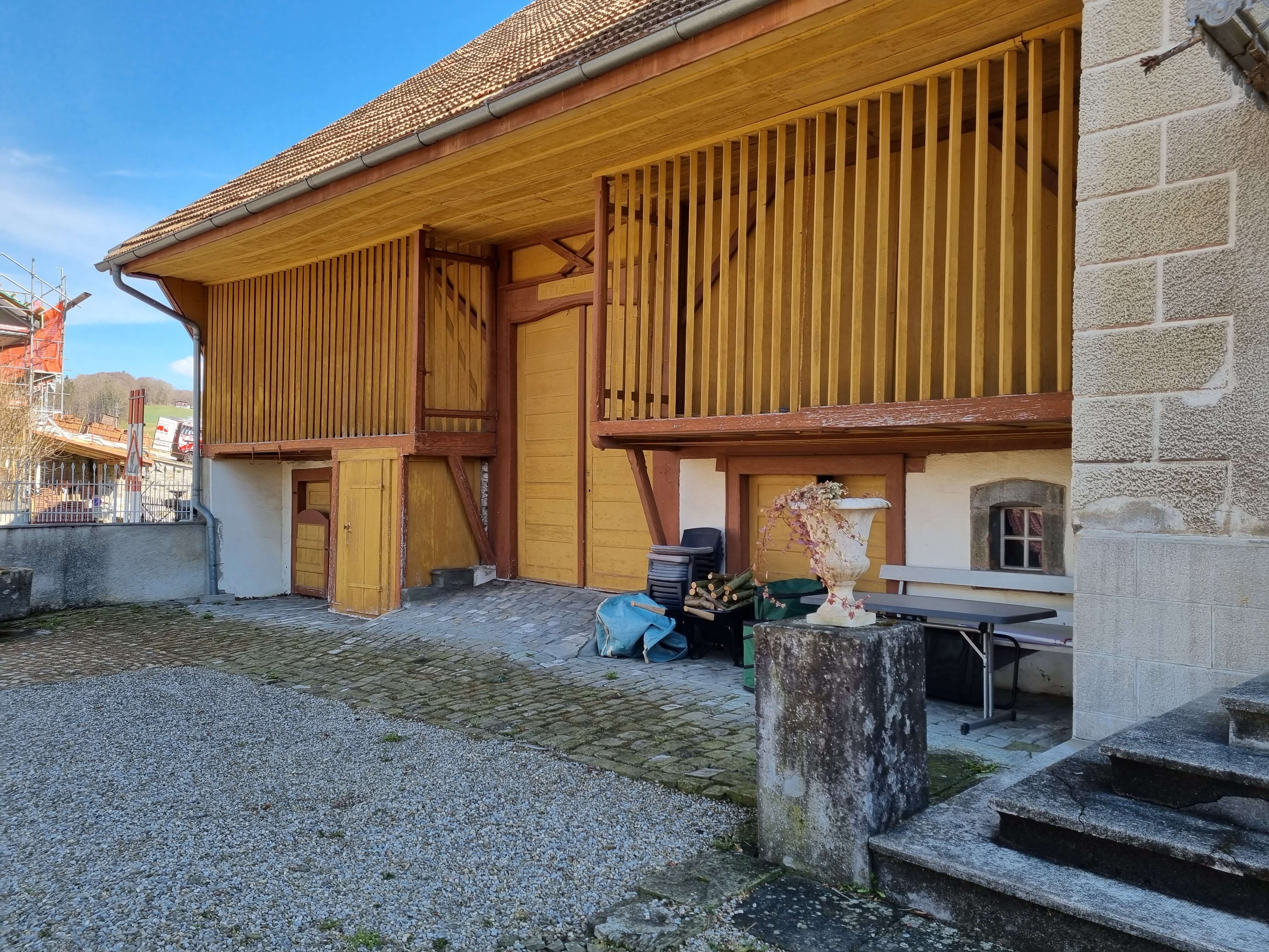 Transformation d'une grange protégée en habitation à Echarlens (Fribourg)