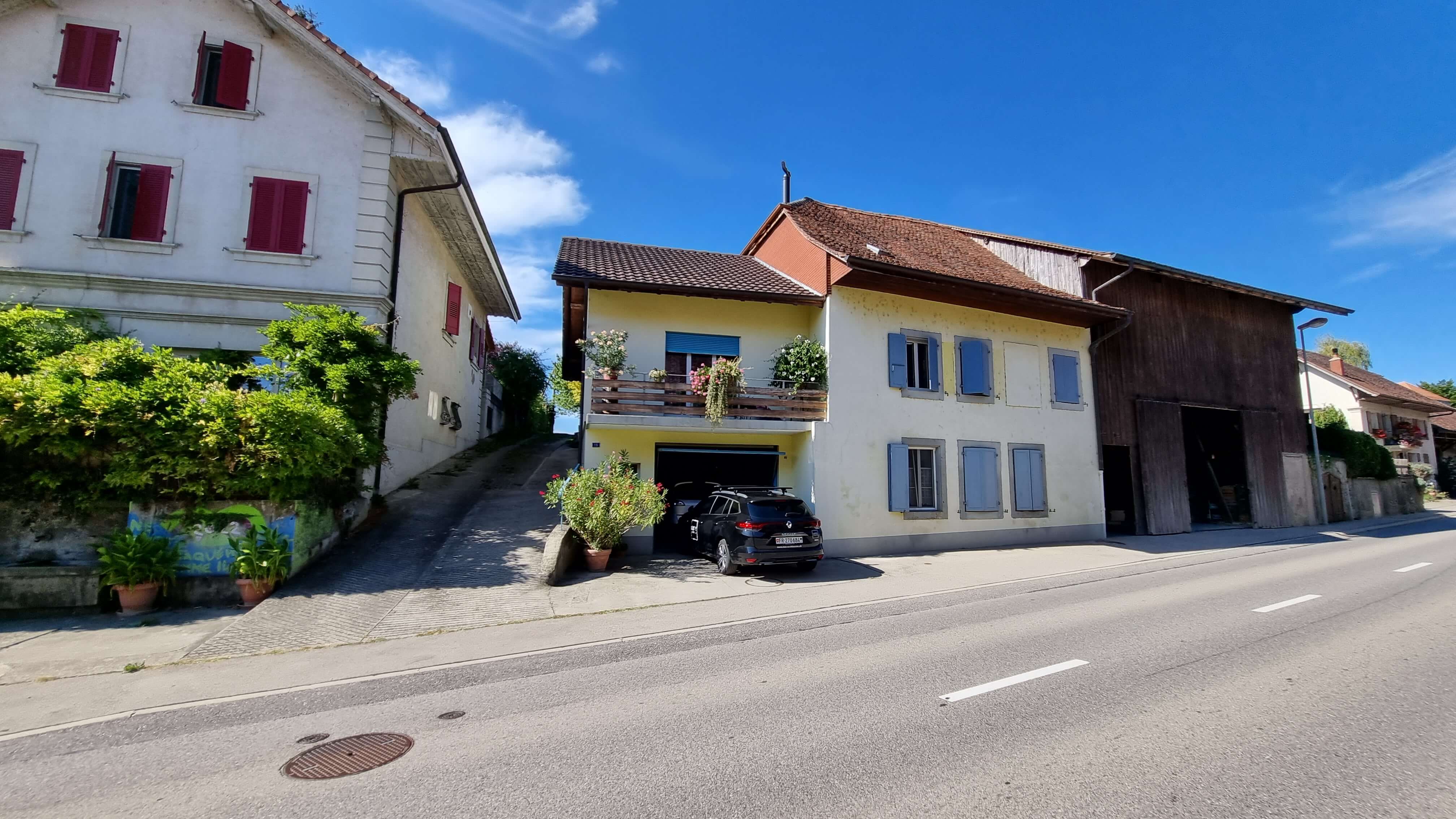 Transformation d'un hangar à tabac et agrandissement d'une maison villageoise à Missy