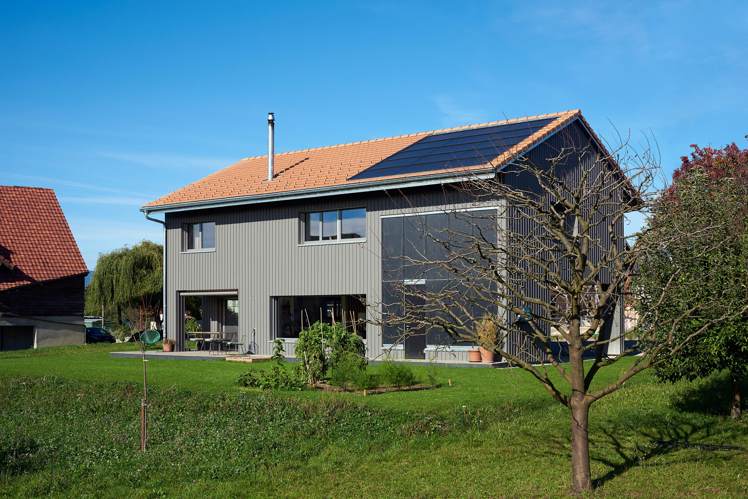 Construction d'une maison écologique en bois à Forel, Fribourg