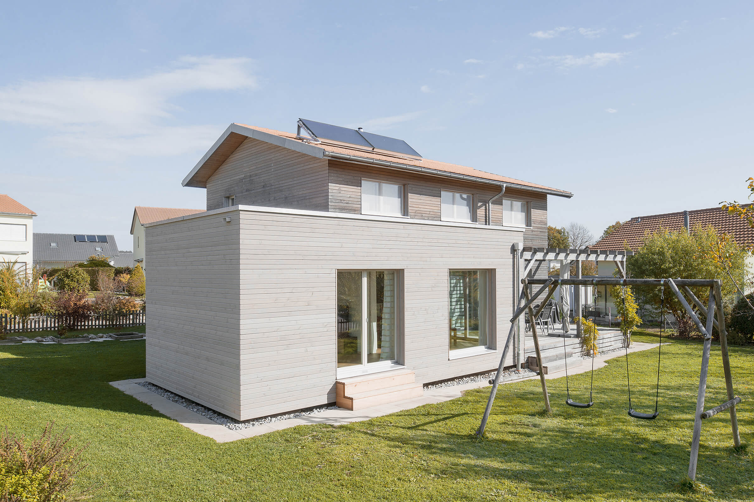 Agrandissement d'une maison familiale passive avec une annexe en bois